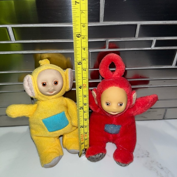 7 adorable teletubbies. Includes plush and plastic teletubbies! And plastic toy. - Picture 5 of 16